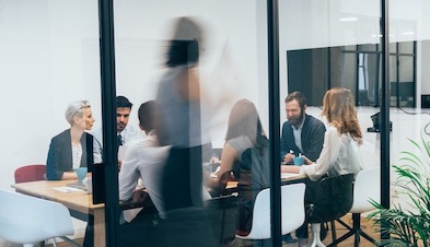 Business team conducting meeting in conference room