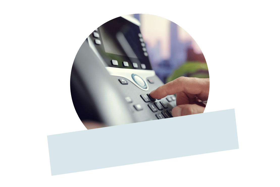 Desk-phone hardware on an office desk.